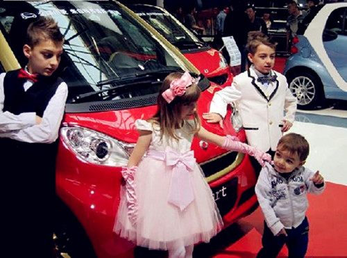 Cute kid model at Qingdao int'l auto show