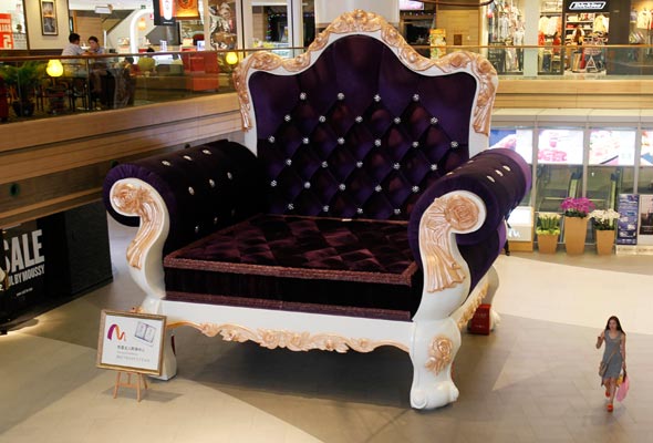 Giant chair in Shanghai dwarfs shoppers