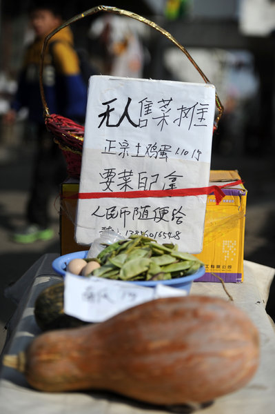 Self-service vegetable and newspaper stands in China