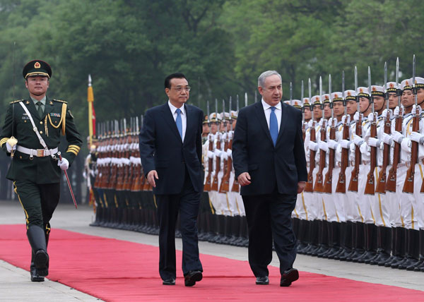 Li meets Israel PM, urging cooperation