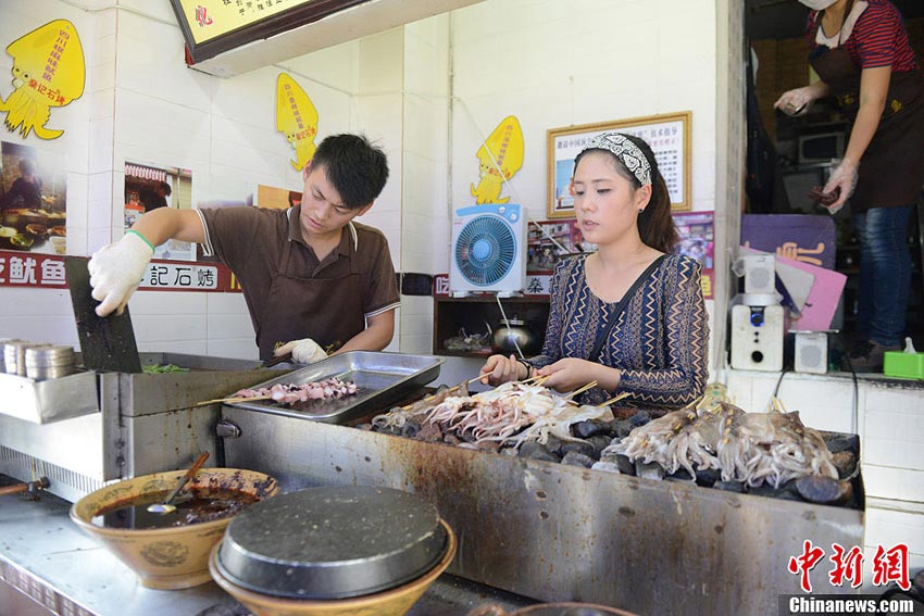 'Squid beauty' and her profitable BBQ store