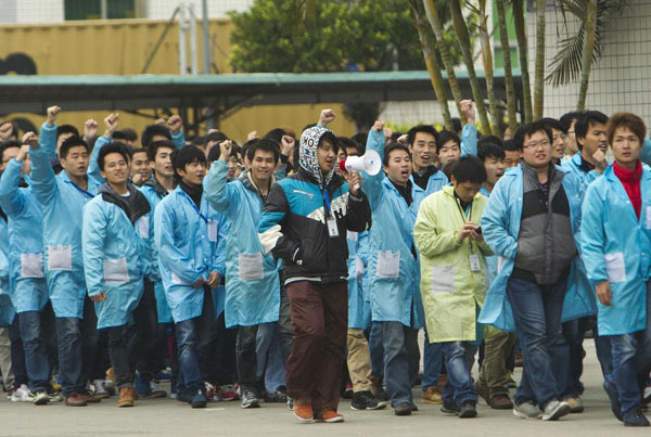 IBM Guangdong plant hit by strike over workers' severance package