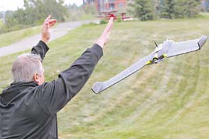 Farmer builds own drones to spray crops