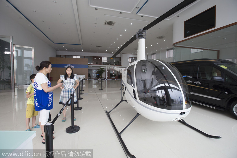 This car dealership sells helicopter