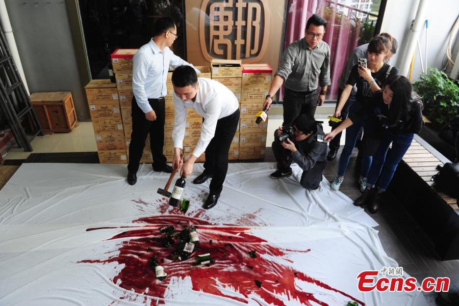 Wine dealer smashes fake Chateau Lafite in Shenzhen