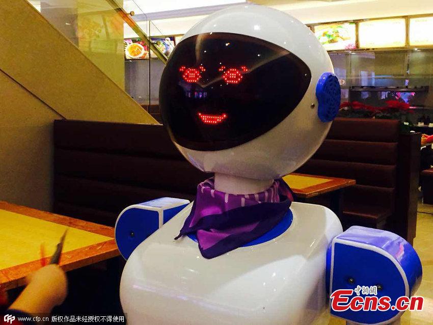 Robot waiters serve in Ningbo restaurant