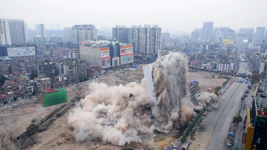 Wuhan brings down building with controlled blasting