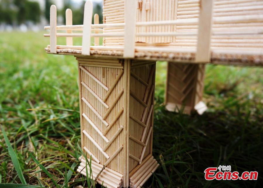 Students create 'villas' with small wooden sticks