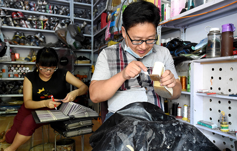 Couple with disabilities thrive in a shoe repair shop