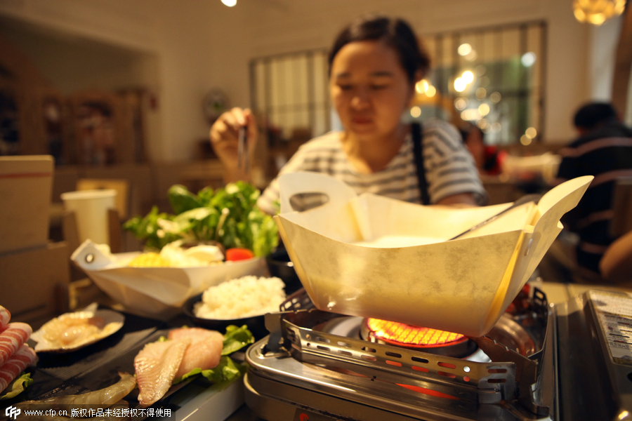 Eating with carton-made hotpot in Shanghai