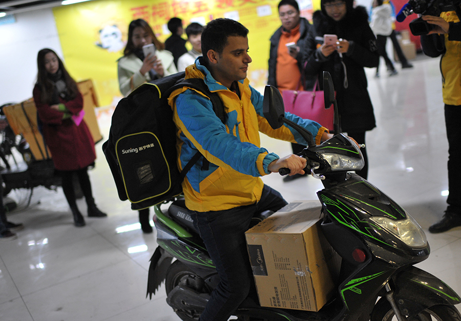 Suning hires expats as couriers on Chinese New Year holiday