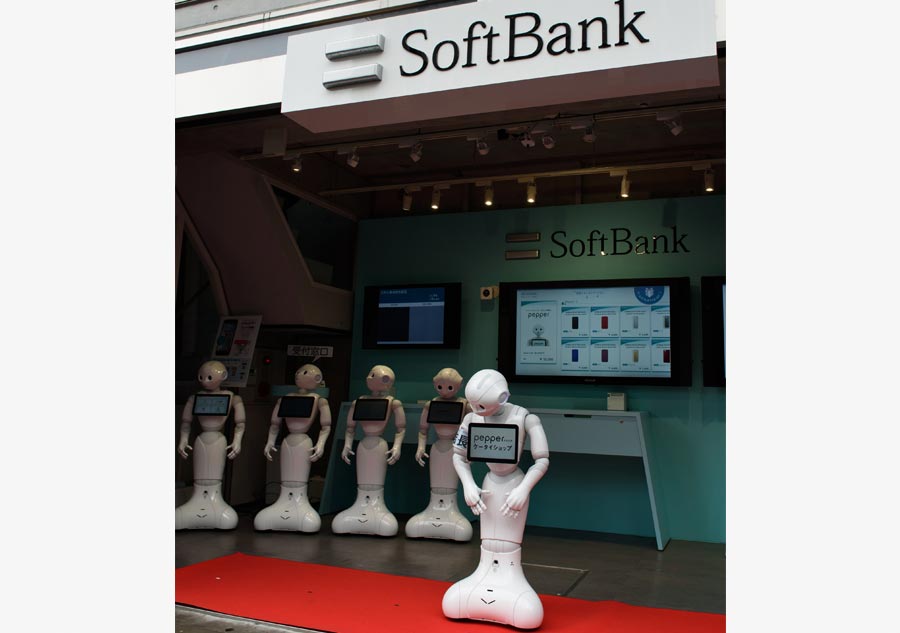 SoftBank staffs cell phone store with Pepper robots