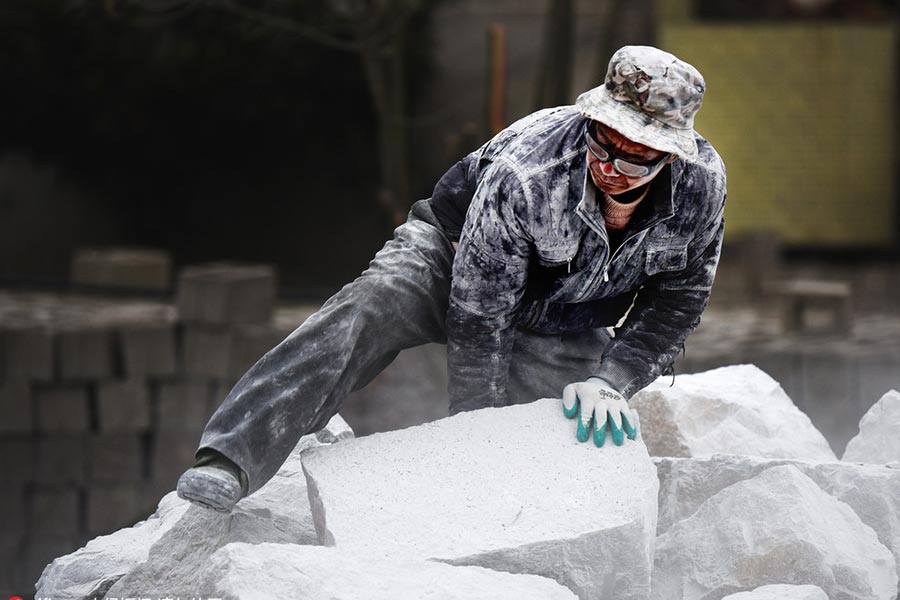 The snowy world of a tombstone carver