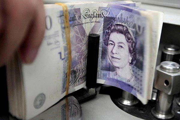 Pound dips to its lowest since 1985