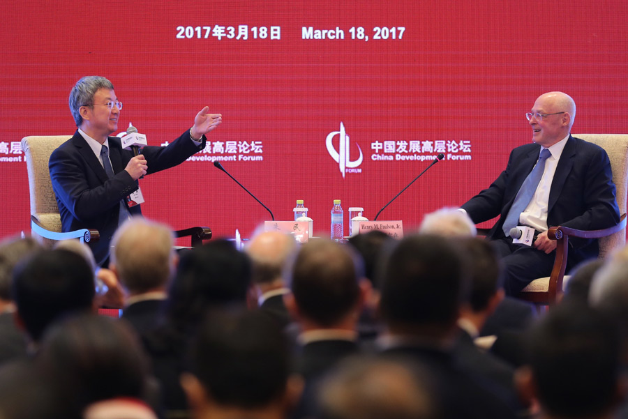 Global minds share insights into China's economic transformation