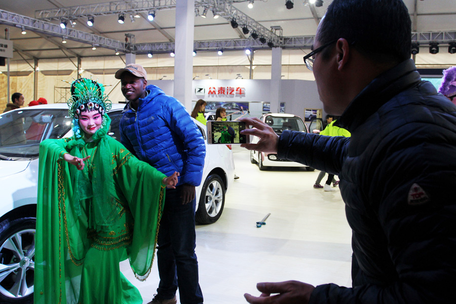 Tradition meets technology: Wu Opera performers take over car show