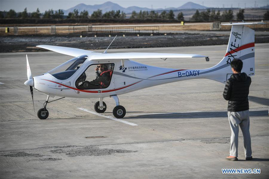 China's 1st electric plane makes maiden flight