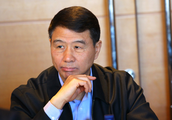 Yi Xiaozhun appointed as deputy chief of WTO