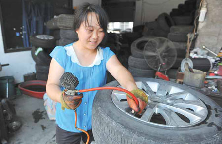On a roll, tire makers expand outlets