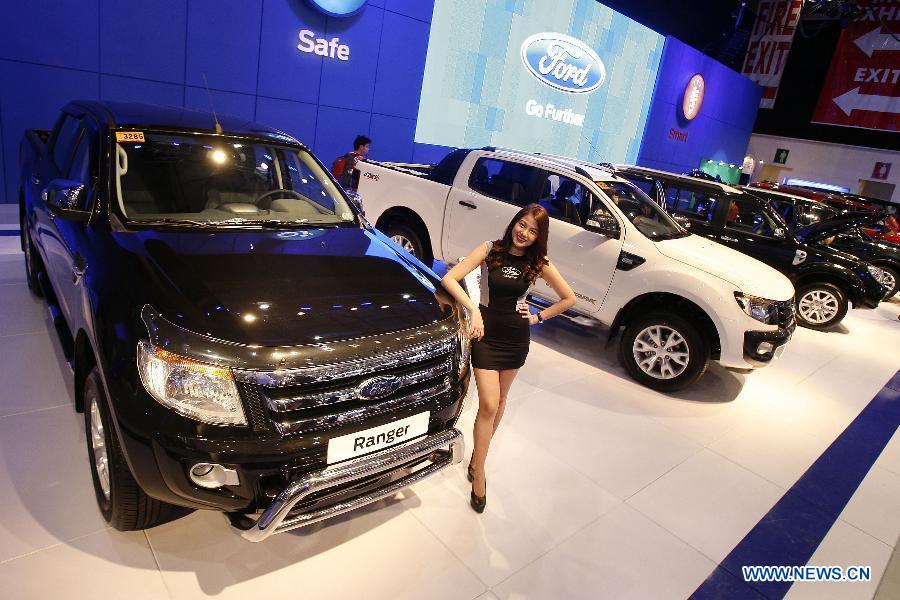 Cars, models at 10th Manila Intl Auto Show