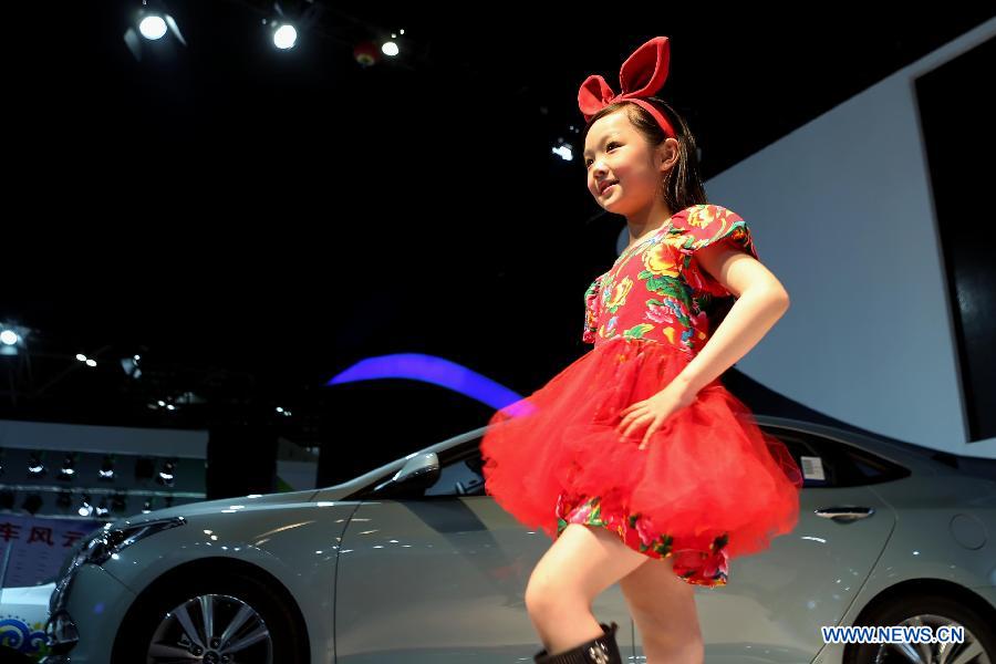 Adorable kids model at Taiyuan auto show