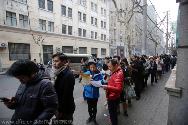 People line up for license plates in Shanghai