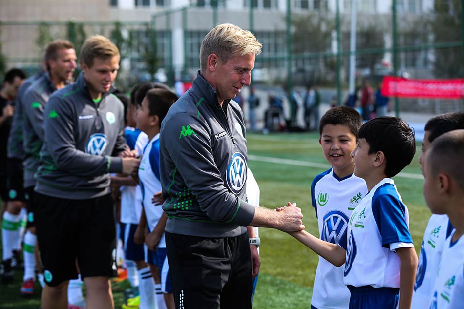 VW helps train young football stars in China