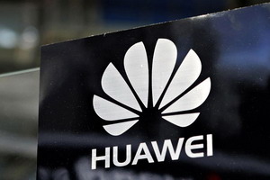 Beijing slams spying on Huawei