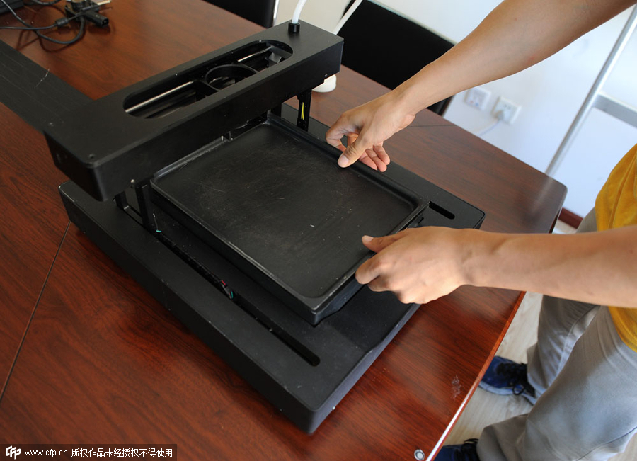 Tsinghua graduates invent 3-D pancake-printing machine