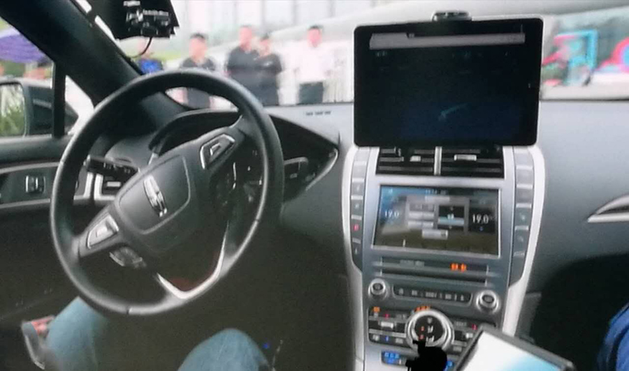 Baidu chief takes spin in a self-driving car