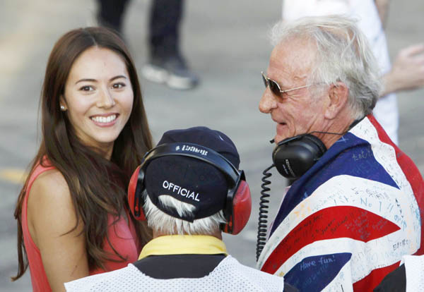 Jessica Michibata cheers for Button