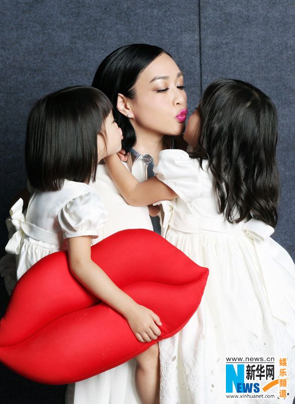 Christy Cheung and daughters pose for magazine