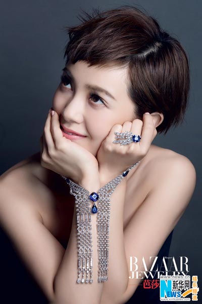 Elegant Amber Kuo pose with fine jewelry