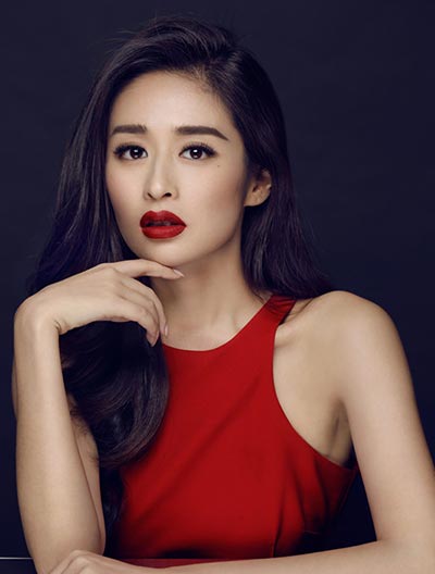 Actress Ying Er poses in red