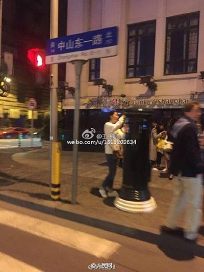 Fans line up in Shanghai to pose with postbox touched by pop star