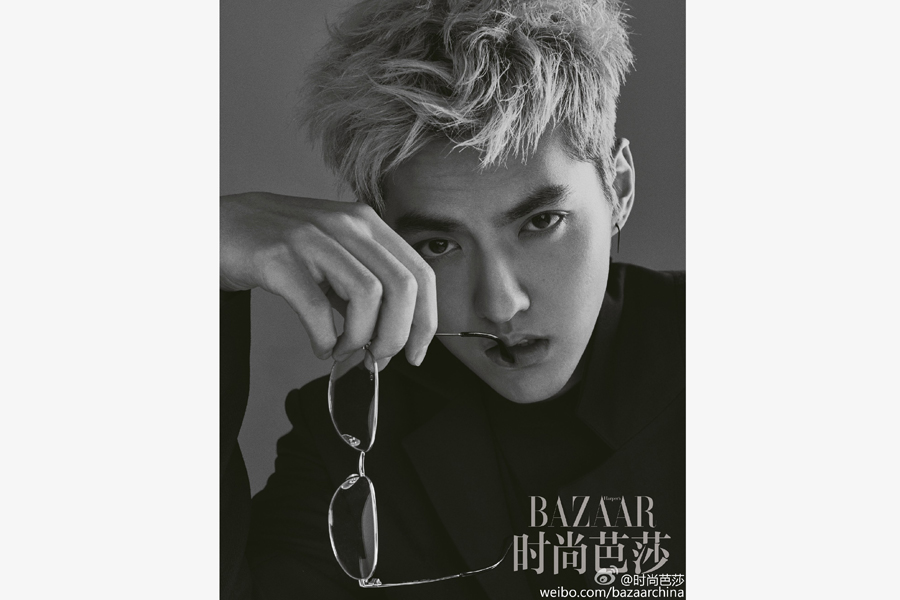 Kris Wu poses during a photoshoot for 'Bazaar Men' magazine.