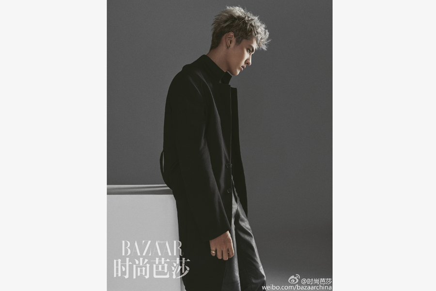 Kris Wu poses during a photoshoot for 'Bazaar Men' magazine.