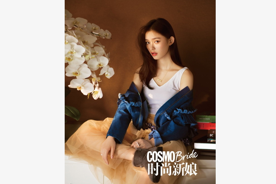 Actress Lin Yun poses for fashion magazine