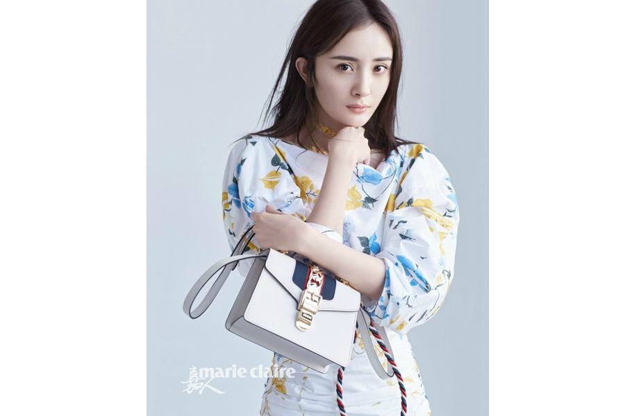 Actress Yang Mi poses for fashion magazine