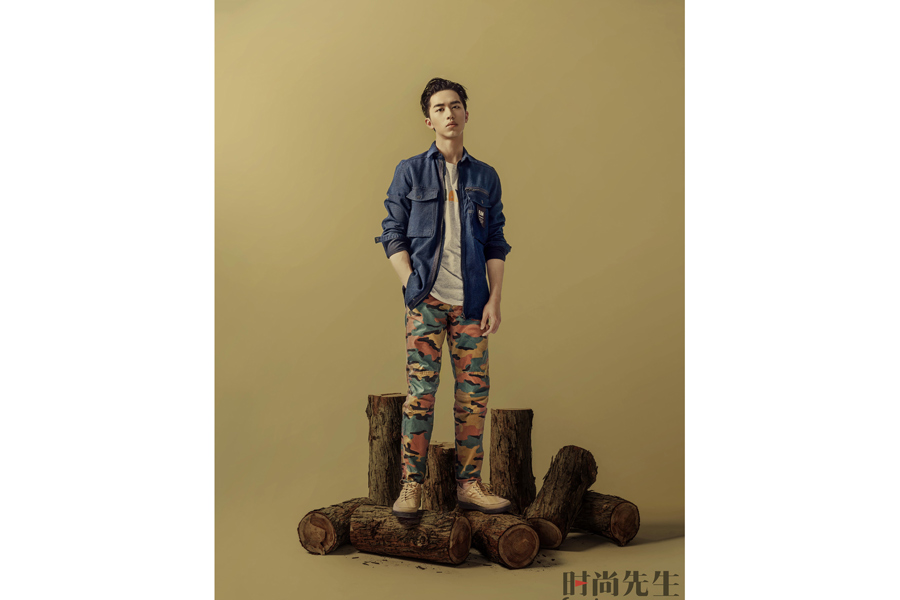 Actor Xu Weizhou poses for fashion magazine
