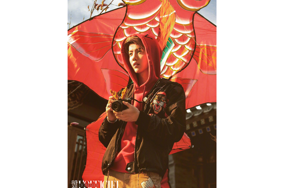 Actor Lu Han poses for fashion magazine