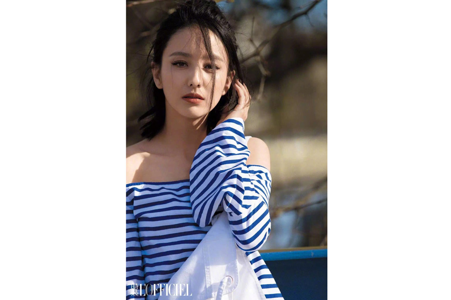 Actress Tong Liya poses for fashion magazine