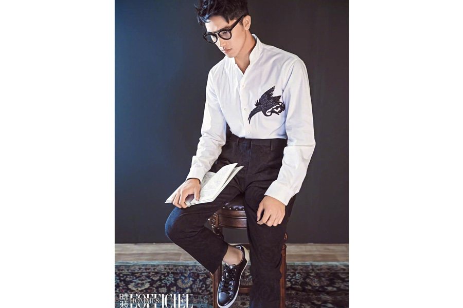 Actor Xu Weizhou poses for fashion magazine