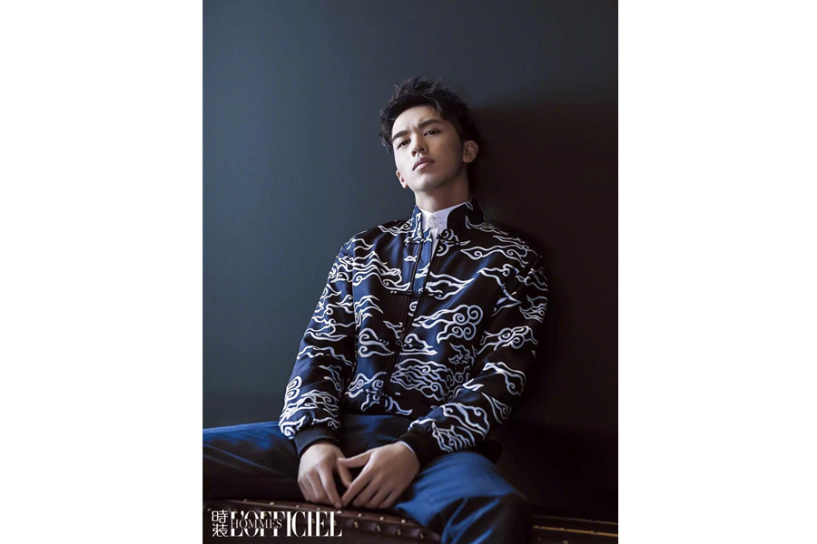 Actor Xu Weizhou poses for fashion magazine