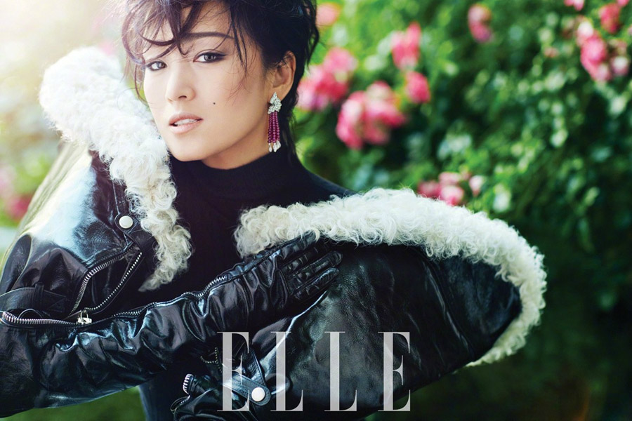 Chinese actress Gong Li poses for fashion magazine