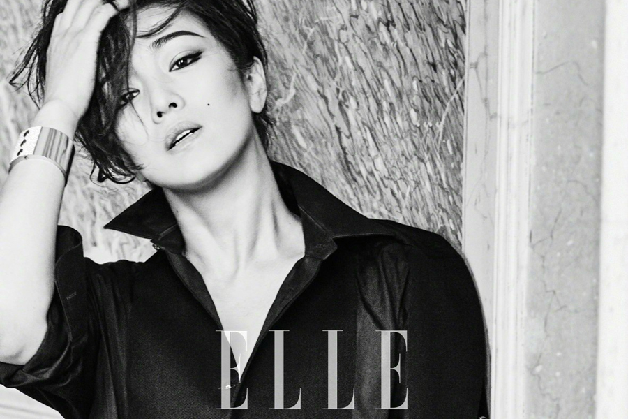 Chinese actress Gong Li poses for fashion magazine