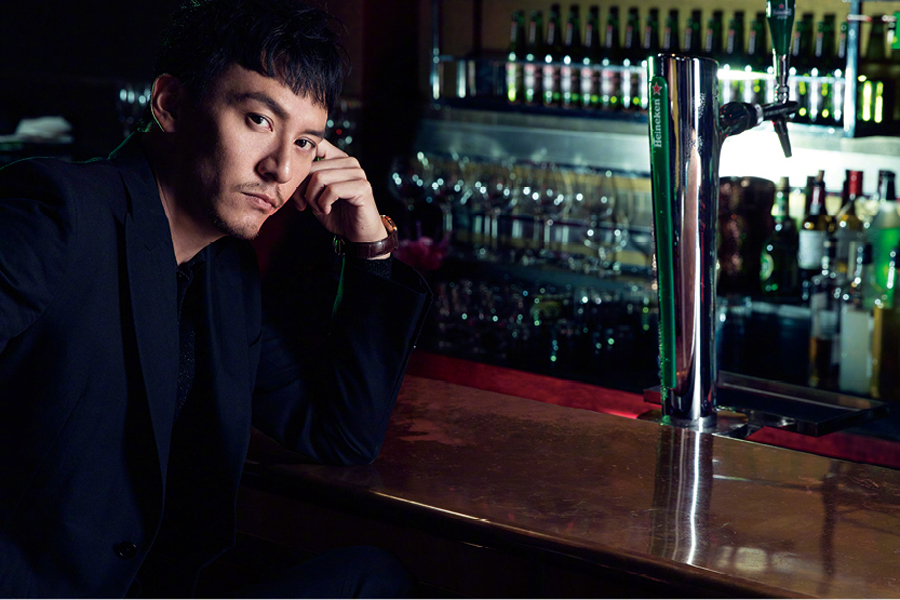 Actor Zhang Zhen poses for the fashion magazine