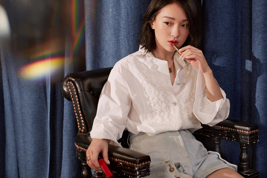 Actress Zhou Xun spotted in red lip