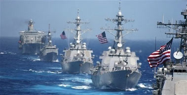 In this photo released by the U.S. Navy on Monday June 19, 2006, USS Cowpens (CG 63), foreground, is followed by USS Lassen (DDG 82), USS John S. McCain (DDG 56), USS Vandegrift (FFG 48) and USNS Tippecanoe (T-AO 199) during a photo exercise to kick off Exercise Valiant Shield 2006 in the Pacific Ocean on Sunday June 18, 2006.