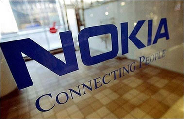 The Nokia logo on the door of the premises in Helsinki, in June 2004. Struggling Japanese electronics maker Sanyo Electric said it has given up potentially lucrative plans to tie up on mobile handsets with Finnish giant Nokia as the firms had failed to reach a compromise.(AFP